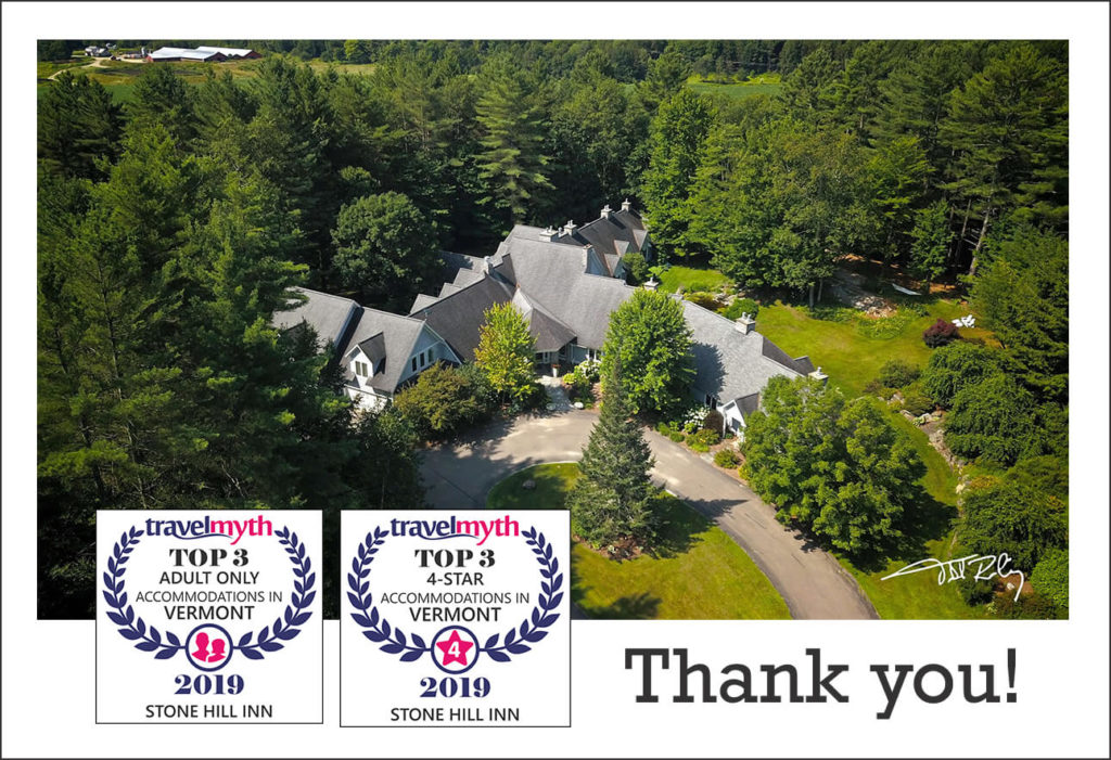 Stone Hill Inn from above, showing two awards for Adult Only and Best 4 Star Accommodations in Vermont